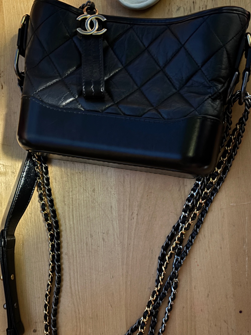 CHANEL Black Quilted Leather Crossbody with Gold-Tone Chain